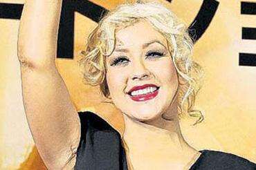 Does Christina Aguilera have breast implants? - Jamaica Observer