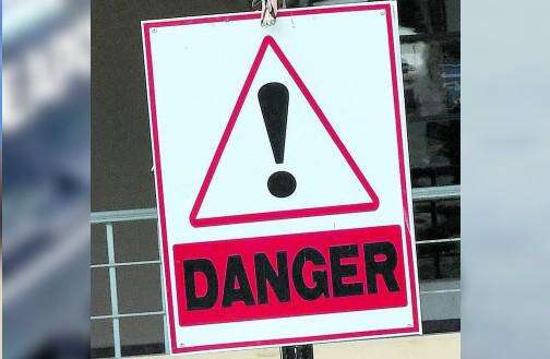 Road embankment collapses in Clarendon, Jamaica, reducing traffic to one lane
