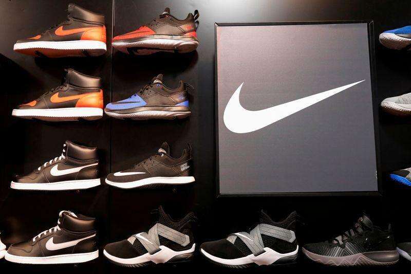 Nike plans job cuts as it forecasts lower sales