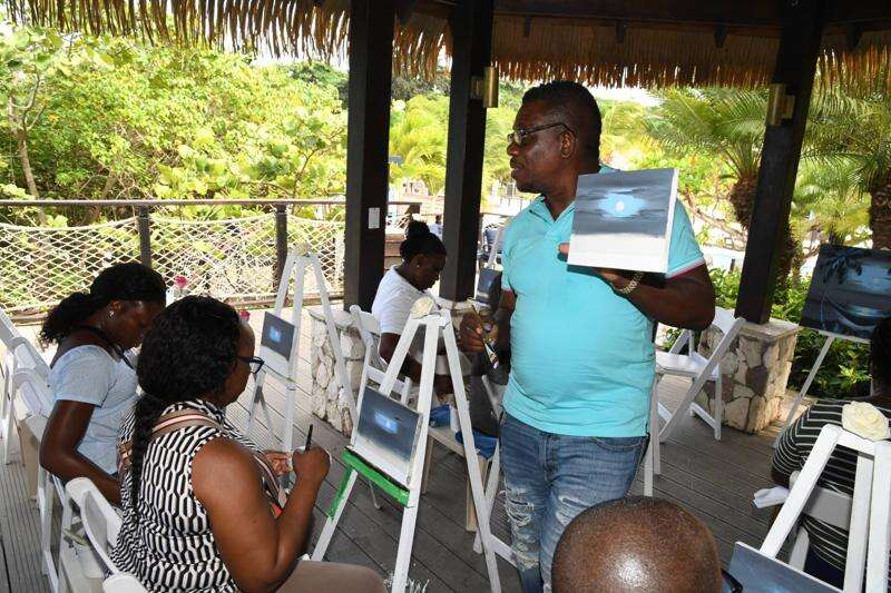 Jamaican travel advisors 'sip and paint' as they experience Sandals