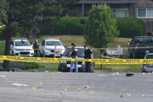 Parking lot party shooting leaves 1 dead and 22 people hurt in suburban ...
