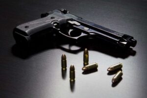 Police launch investigation after gun, ammo found under zinc in Olympic Gardens - Vimarsana News