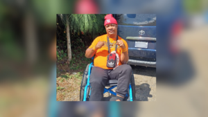 Wheelchair-bound Comrade says nothing could keep him from voting