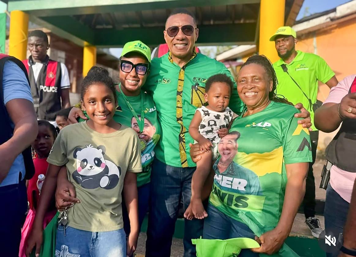 Jamaica Labour Party Leader Dr Andrew Holness (centre) with Jamaicans on the campaign trail in St James ahead of the September 3, 2025 General Election.a
