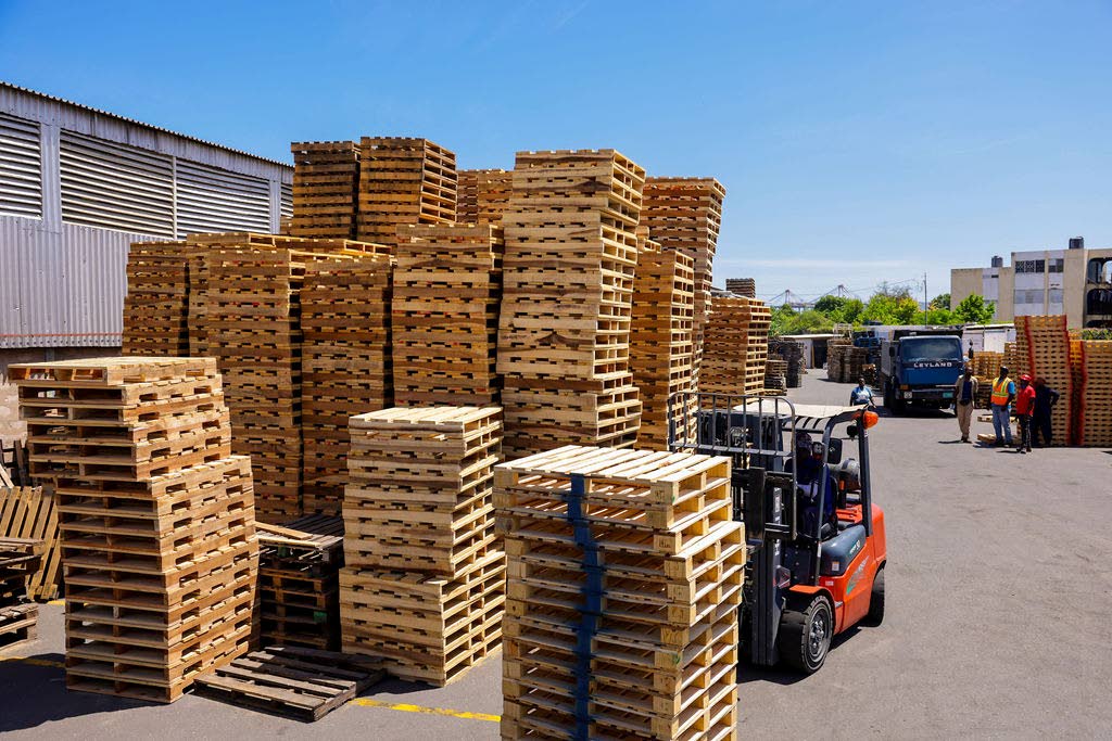 Woodcats stack pallets to keep supply chain stable