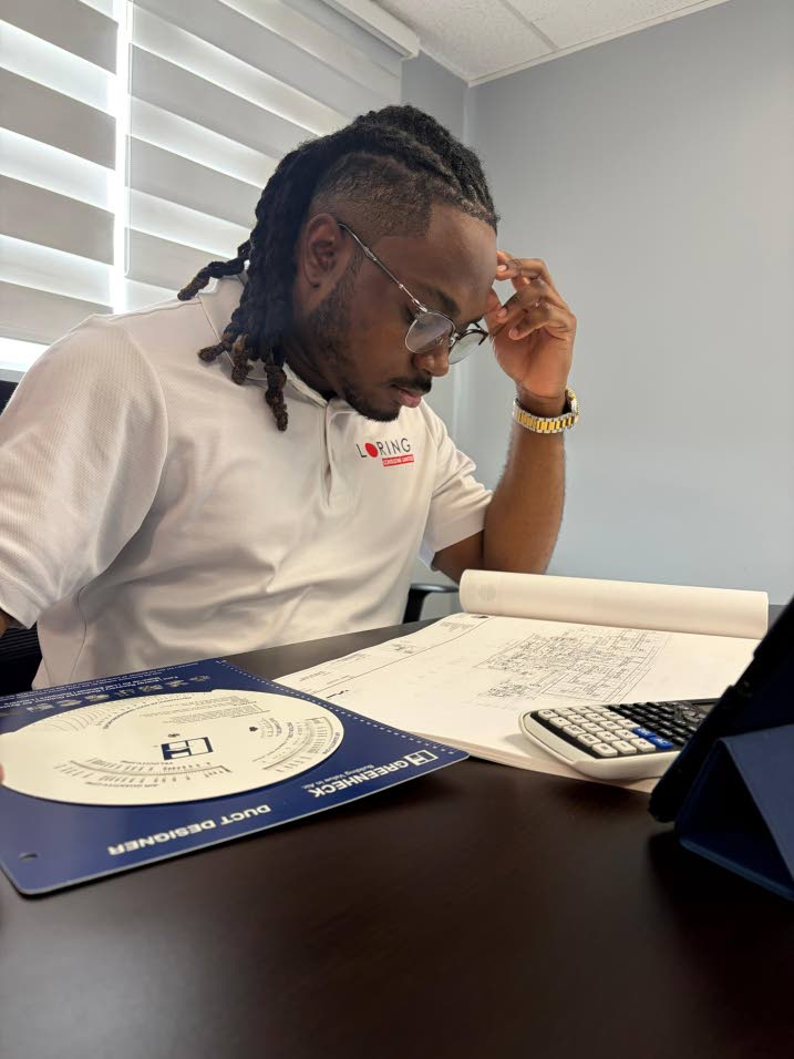 Young engineer shaping systems and skills at Loring Consulting Alex B McFarlane