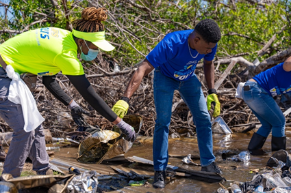 JPS Foundation partners with NEPA and Forestry Department to clean up Parottee wetlands