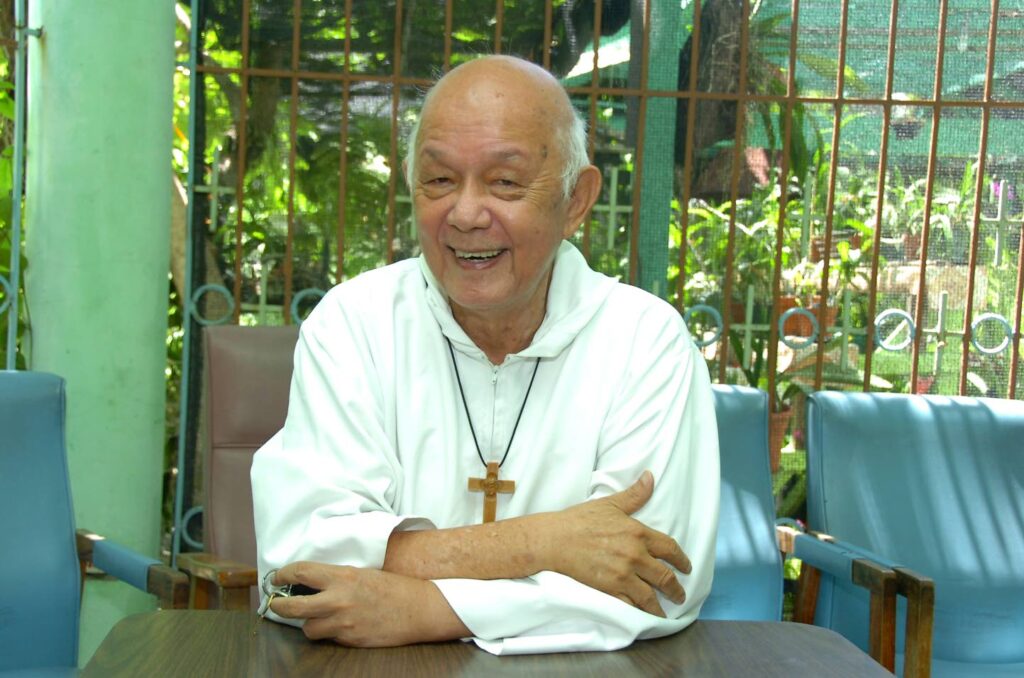 Why do we wear religious garment as Missionaries of the Poor?