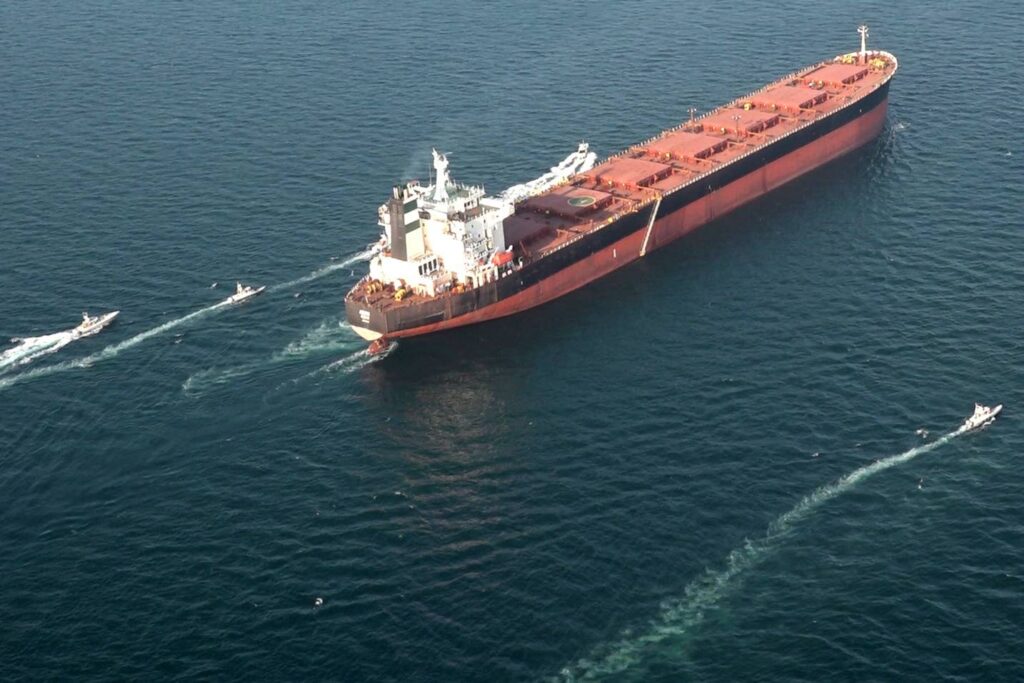 Iran's military warned on Monday that US forces would be attacked if they entered the Strait of Hormuz, after United States President Donald Trump said the United States would help guide ships through the waterway.