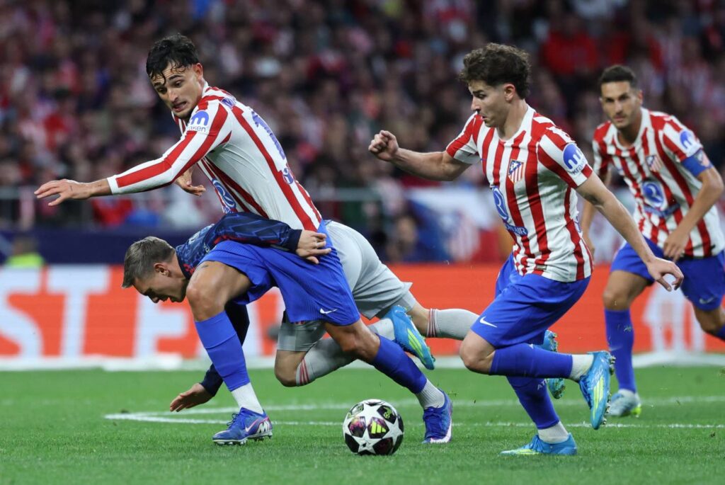 Alvarez penalty rescues Atletico in tense Arsenal semi-final draw