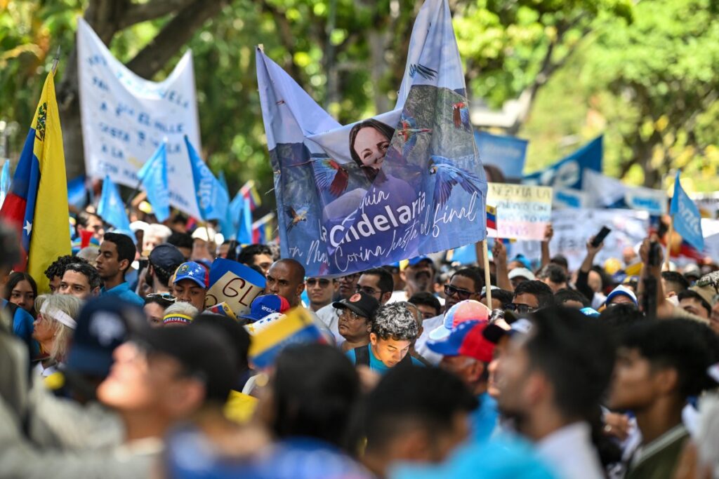Venezuela's political camps protest ahead of transition talks