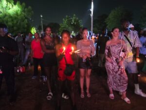 Attendees at the candlelight vigil celebrating Fantan Mojah 