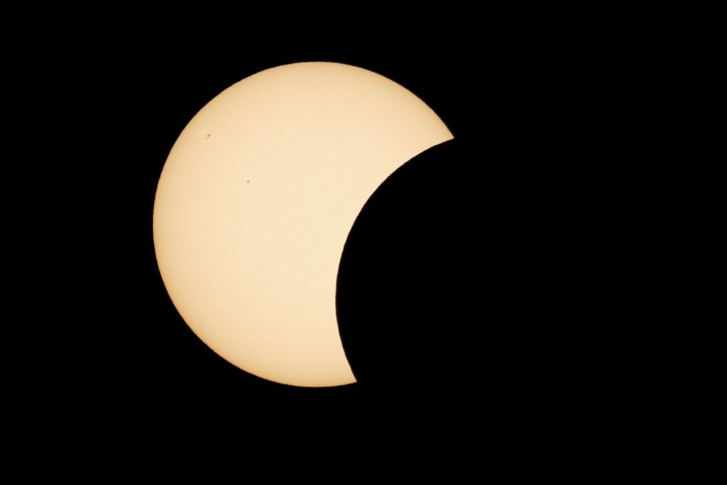 Total solar eclipse plunges cloudy Iceland into darkness