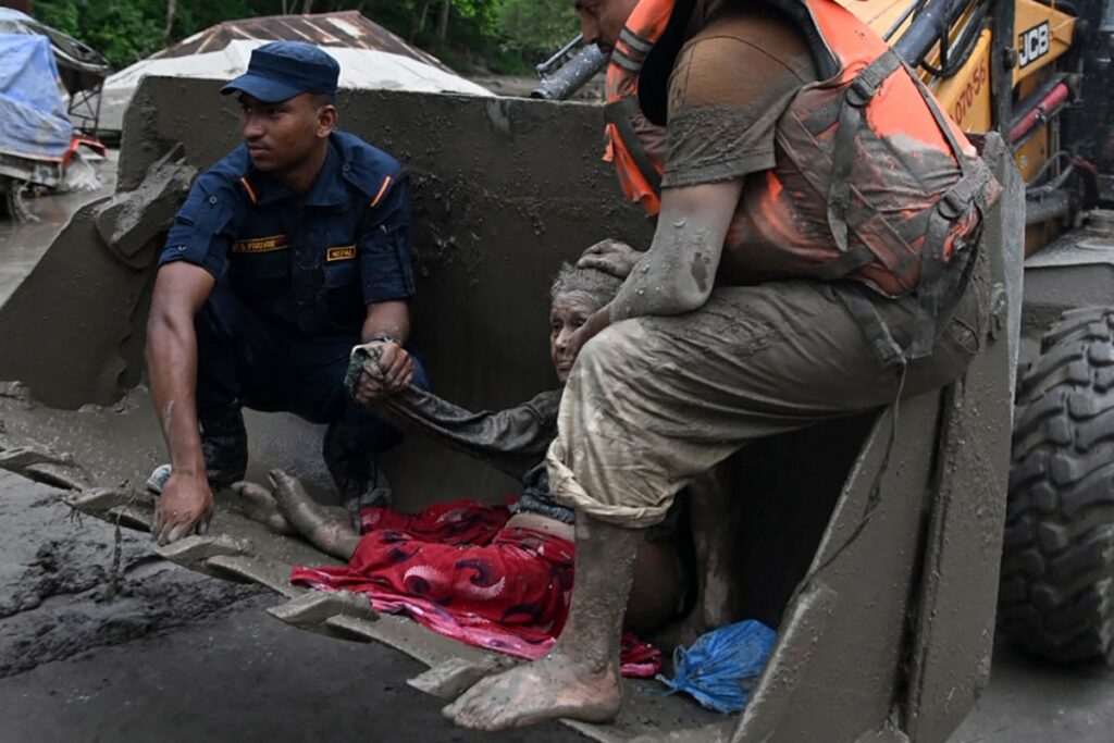 Massive flood near Tibet border kills at least 95 in Nepal
