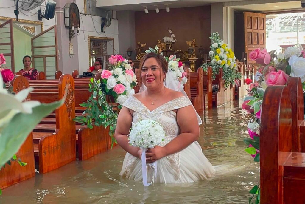 Philippine couple married in hip-deep floodwaters