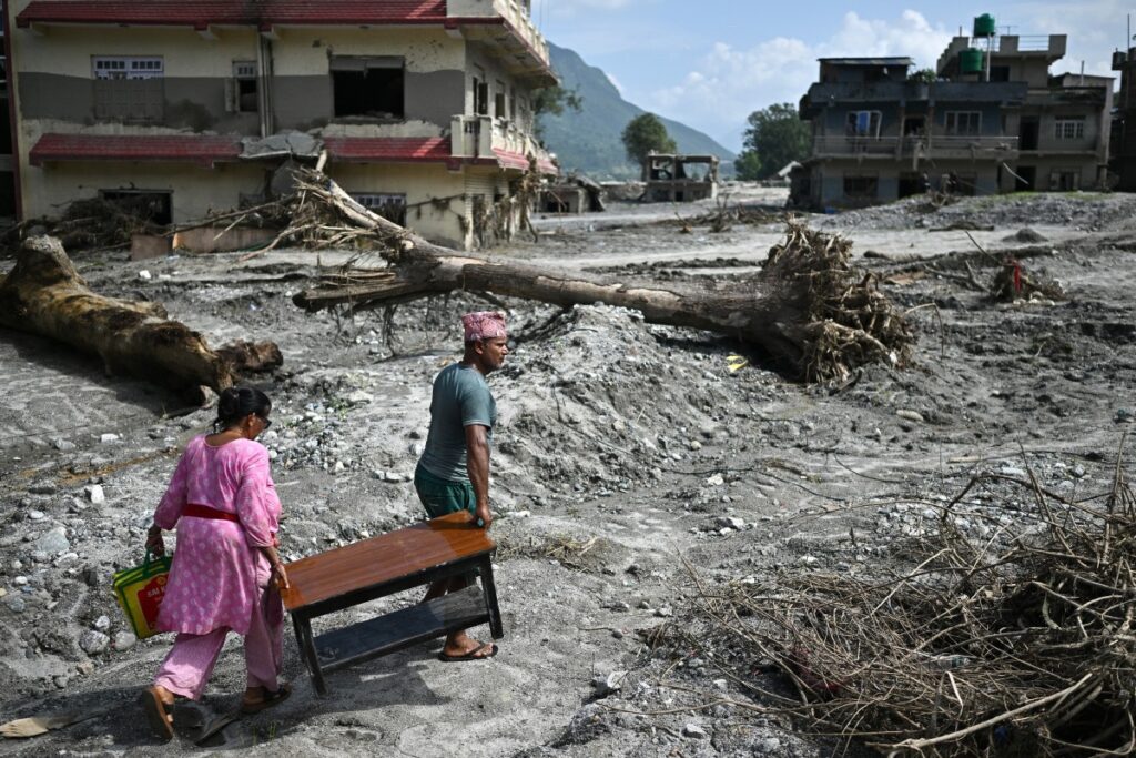 Nepal flood death toll rises as rescuers scour tunnels