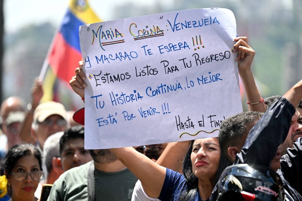 Hundreds protest for return of Nobel peace laureate Machado to Venezuela
